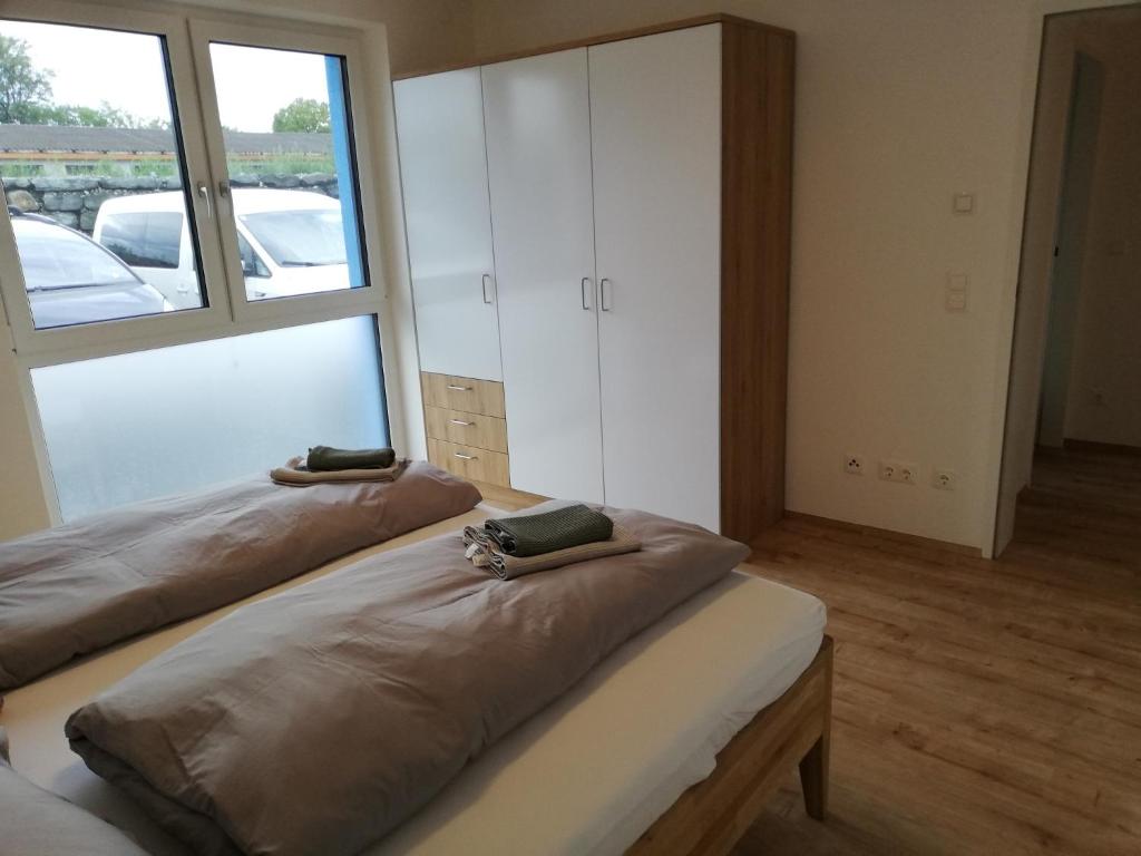 Postel nebo postele na pokoji v ubytování Ferienbungalows Vital