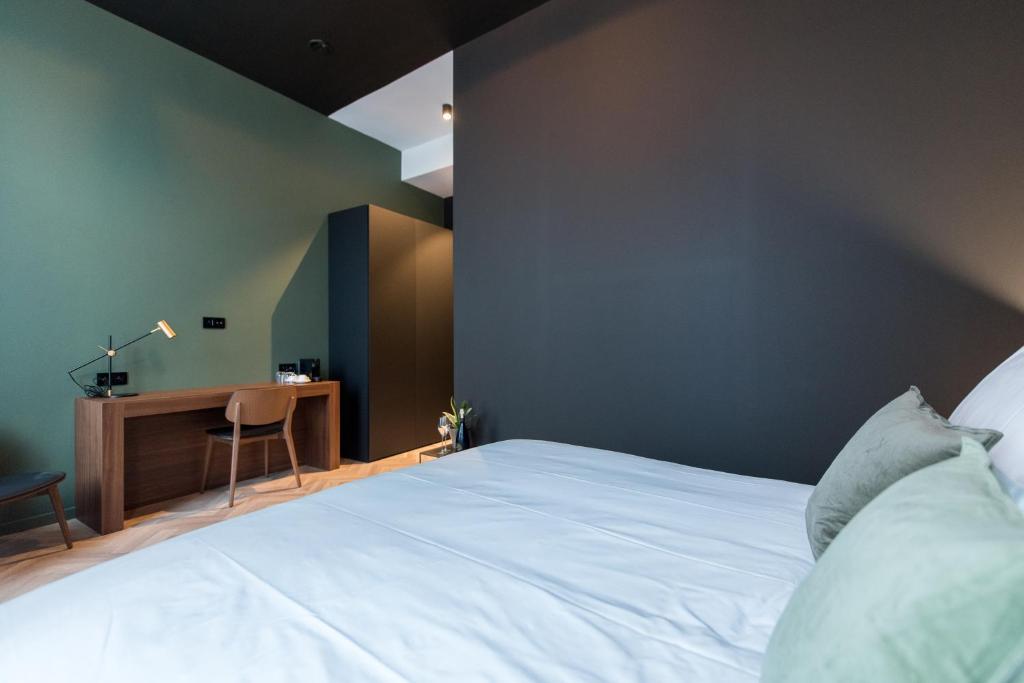 Postel nebo postele na pokoji v ubytování Vinotel X