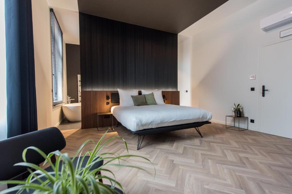 Postel nebo postele na pokoji v ubytování Vinotel X