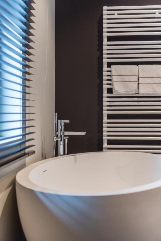 Koupelna v ubytování Vinotel X