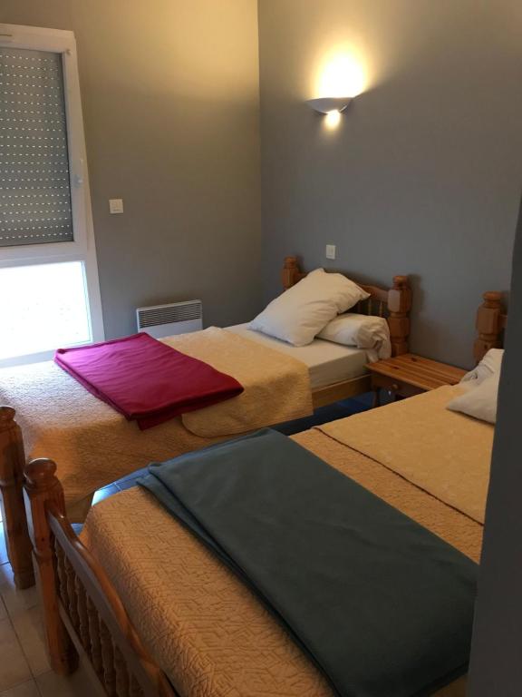 Postel nebo postele na pokoji v ubytování Complexe des Oustalous