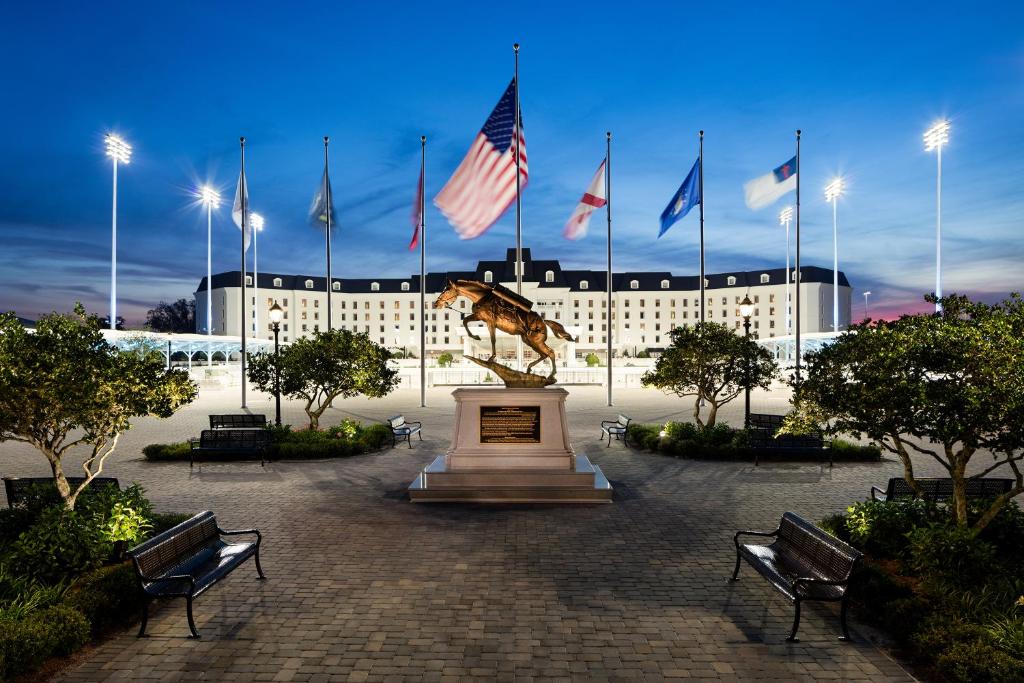 a statue of a horse in front of a building at The Equestrian in Ocala