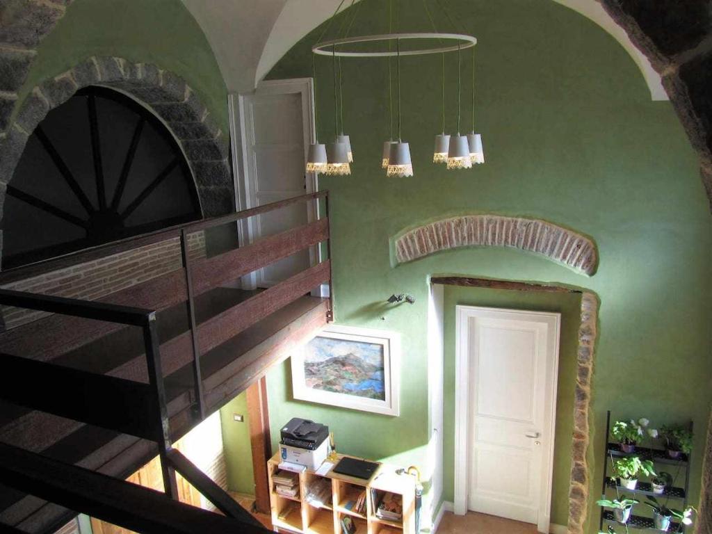 Televízia a/alebo spoločenská miestnosť v ubytovaní B&B ComeinSicily CortedeiLimoni Charming & Relax