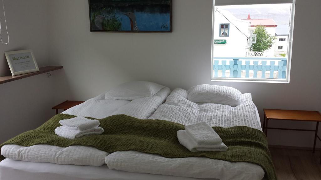 Postel nebo postele na pokoji v ubytování Harbour Inn - Guesthouse