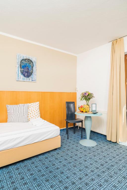 Letto o letti in una camera di Art Hotel Vienna