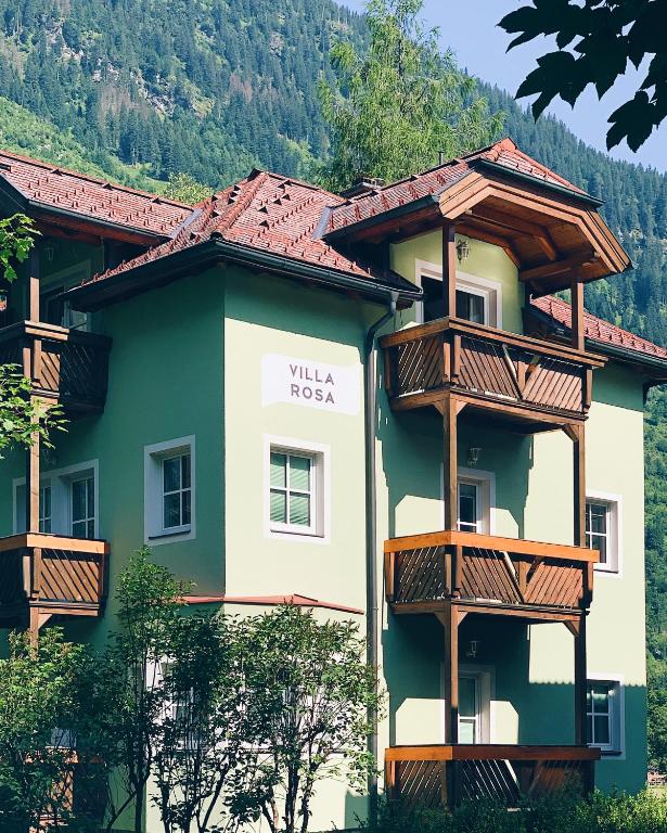 a building with balconies on the side of it at Villa Rosa in Bad Gastein