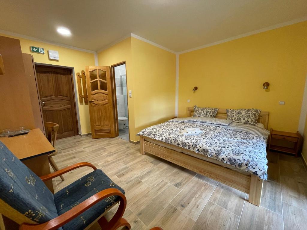 Postel nebo postele na pokoji v ubytování Chata Ramzovské sedlo
