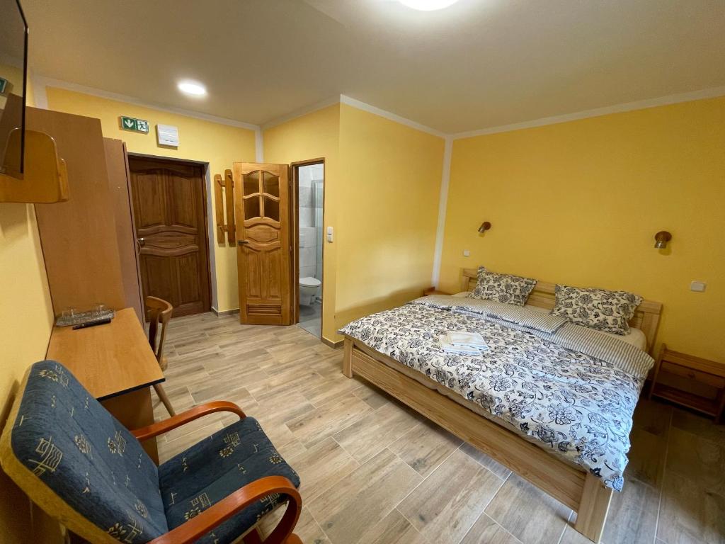 Postel nebo postele na pokoji v ubytování Chata Ramzovské sedlo
