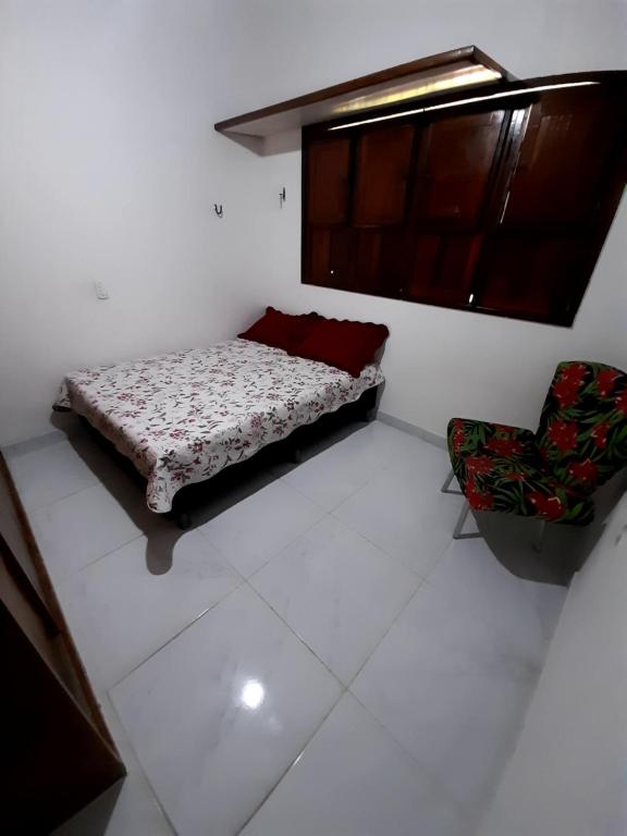 מיטה או מיטות בחדר ב-Ap 09-A 50 Metros da Praia Flats Mobiliados para 4 Pessoas