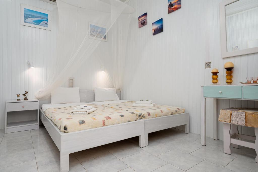 Postel nebo postele na pokoji v ubytování Sofia rooms