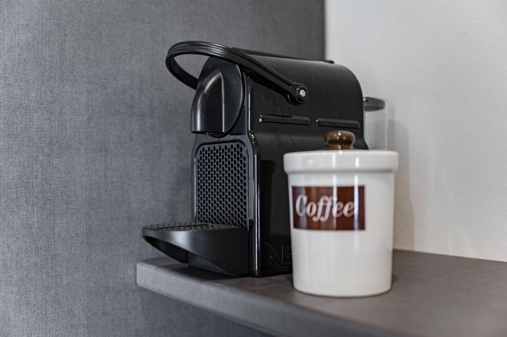 Coffee and tea making facilities at Via Macci, 59 - Florence Charming Apartments - Stylish apartments in a vibrant neighborhood with so comfortable beds!