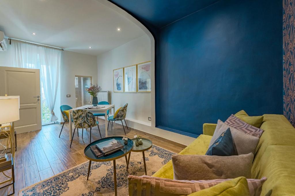 A seating area at Via Macci, 59 - Florence Charming Apartments - Stylish apartments in a vibrant neighborhood with so comfortable beds!