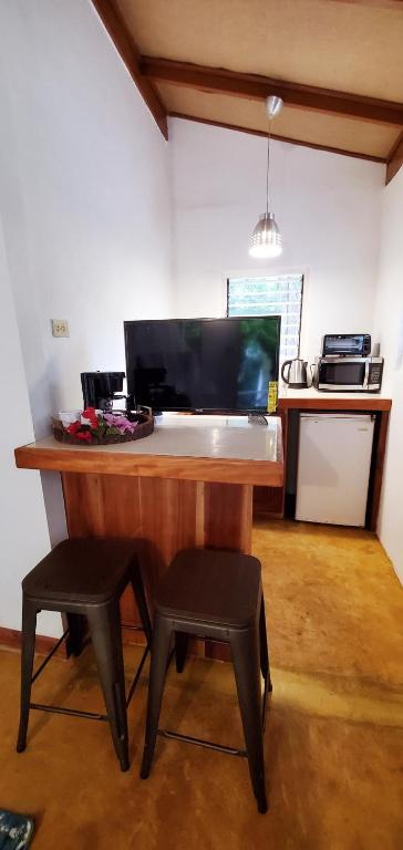 Una cocina o zona de cocina en Bak A Yaad