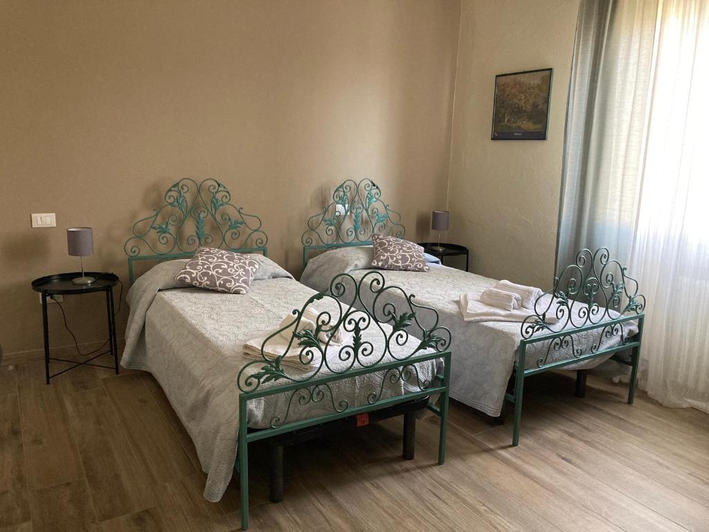 Postel nebo postele na pokoji v ubytování B&B L'Airone