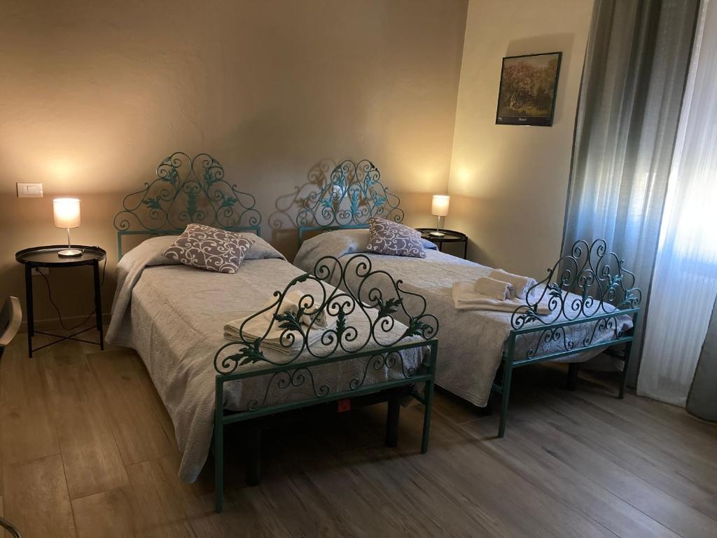 Postel nebo postele na pokoji v ubytování B&B L'Airone