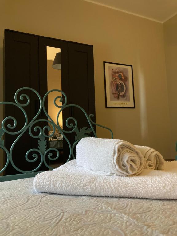 Postel nebo postele na pokoji v ubytování B&B L'Airone