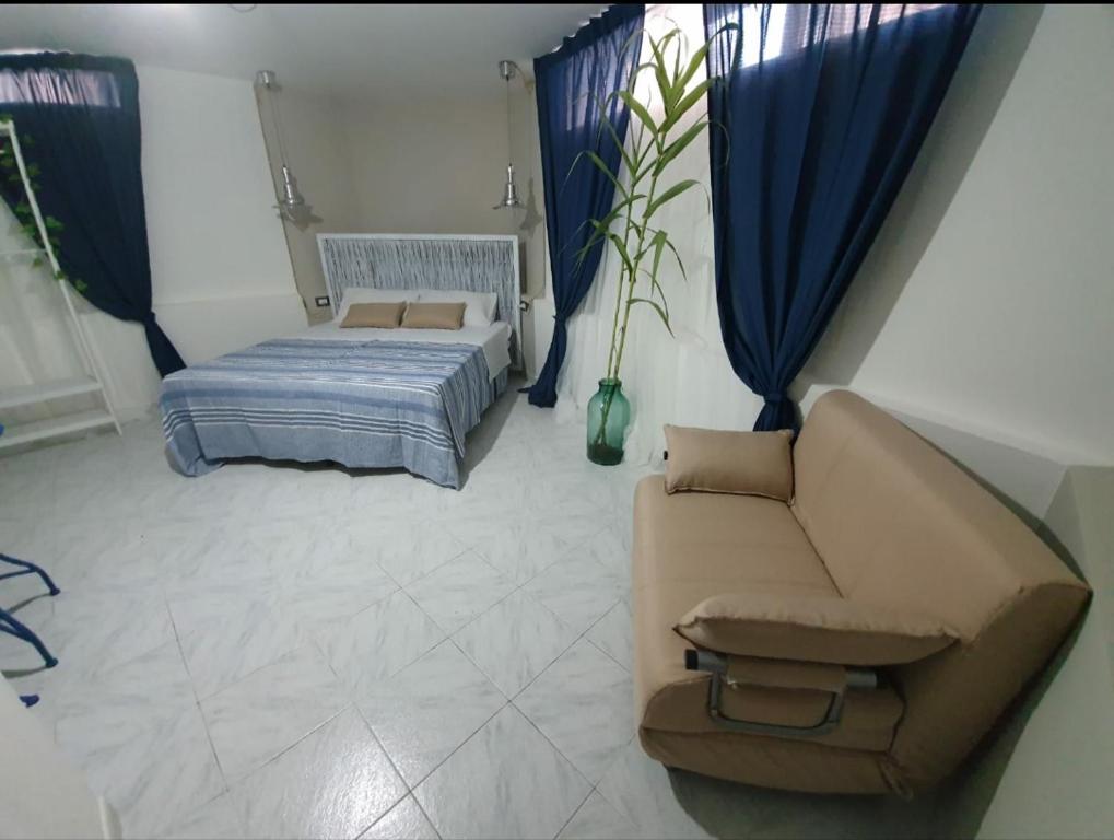 Postel nebo postele na pokoji v ubytování B&B città del carrubo