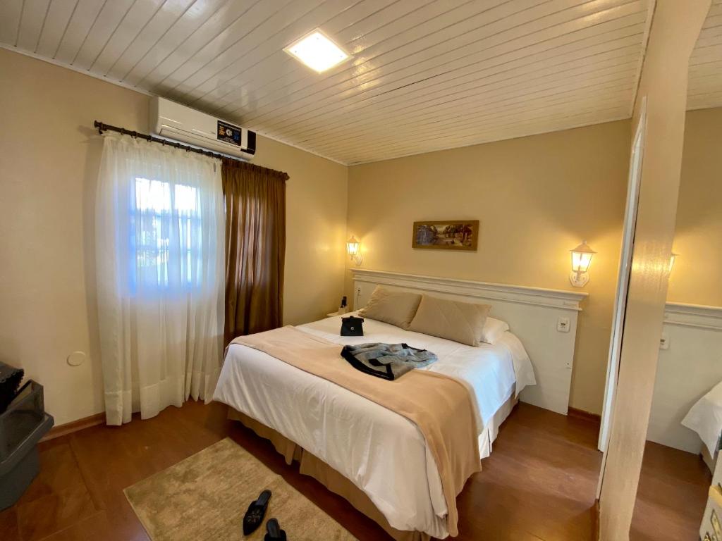 Postel nebo postele na pokoji v ubytování Pousada Cabanas Rota do Sol