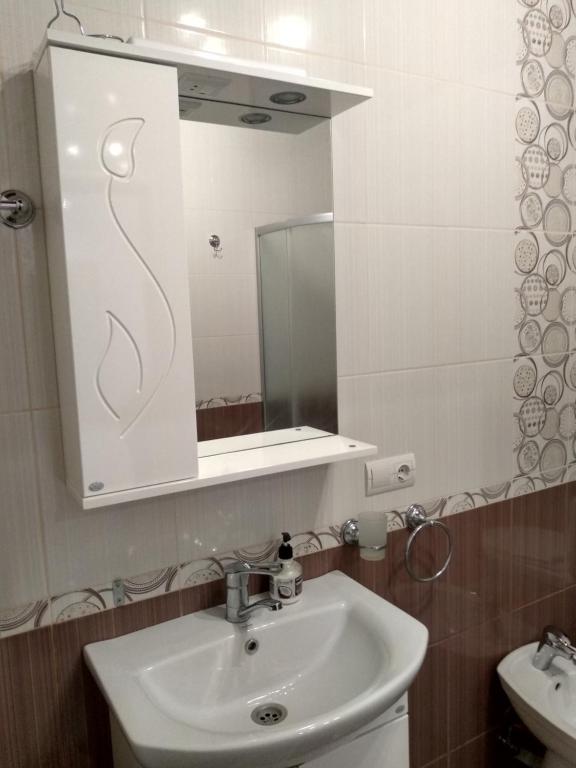 Phòng tắm tại Apartment Ivashchenka 1a