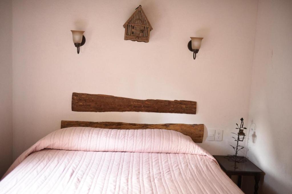 Postel nebo postele na pokoji v ubytování Hotel La Casona Real