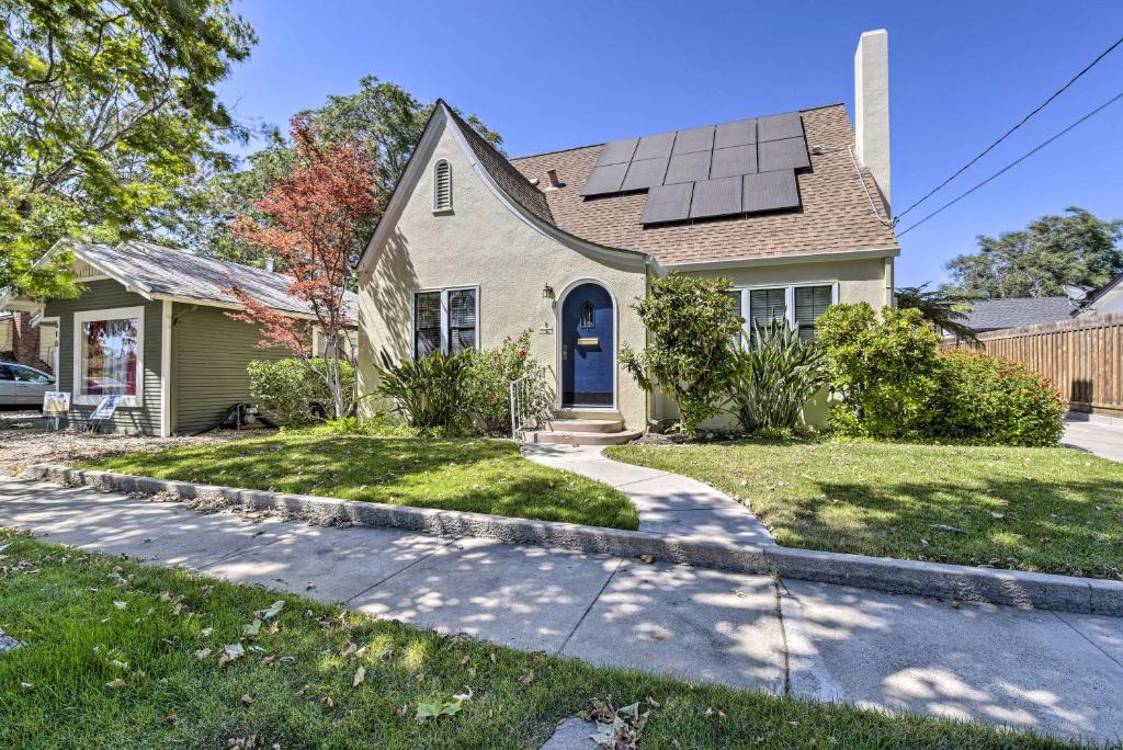 a house with solar panels on the roof at Charming Antioch Home with Private Yard and Grill in Antioch