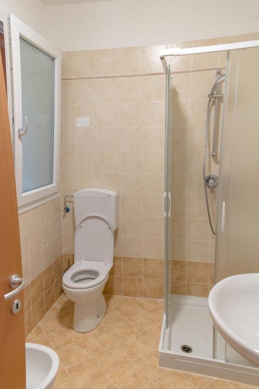 Koupelna v ubytování Residence TANA - via Pasubio