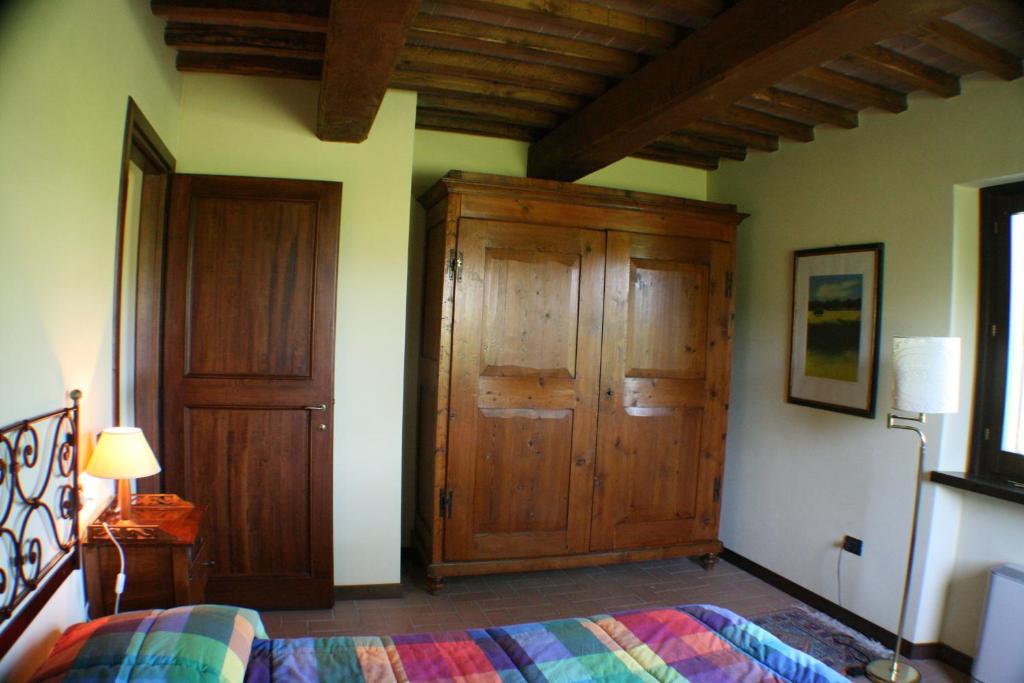 Postel nebo postele na pokoji v ubytování Residenza Isabella