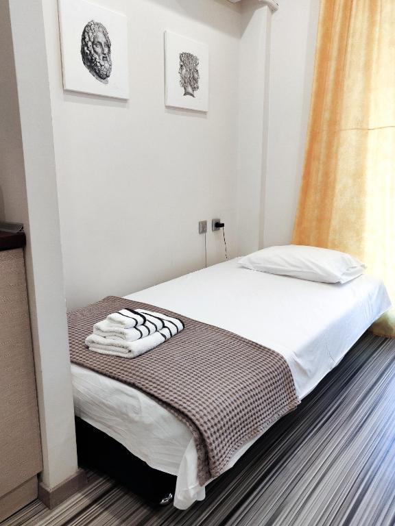 Posteľ alebo postele v izbe v ubytovaní Luxury Suites with KING-SIZED bed