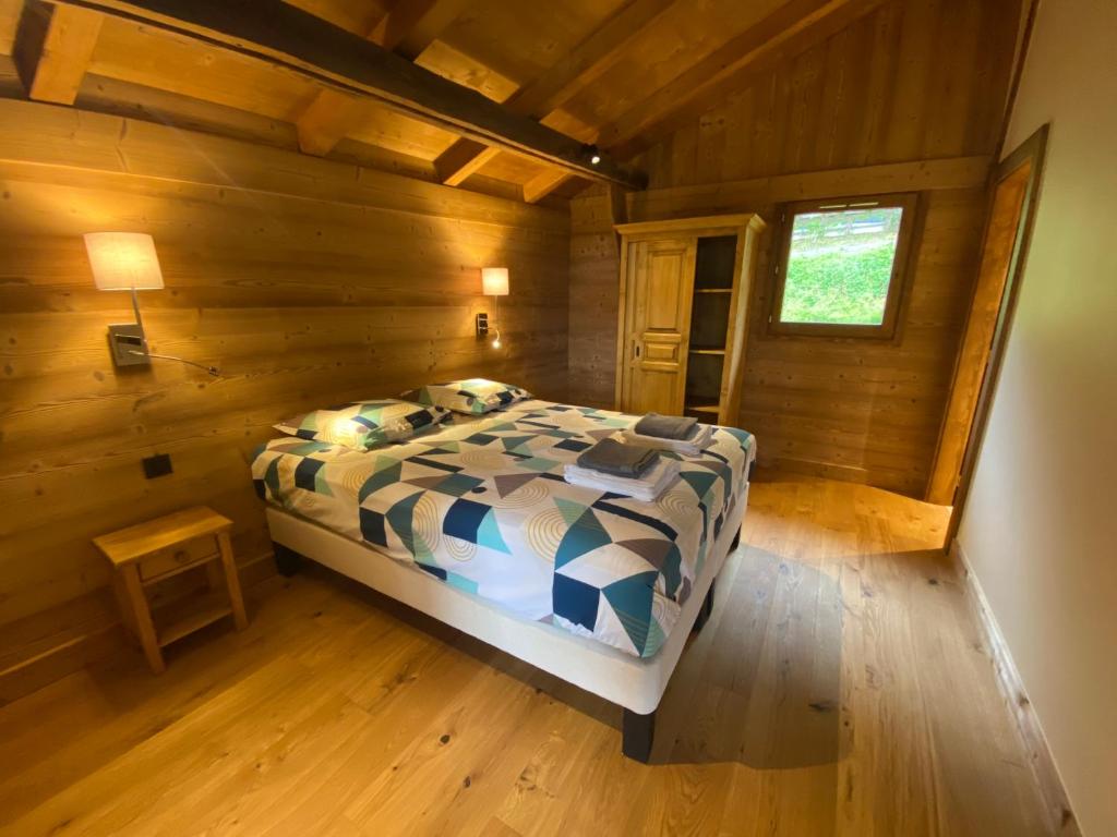 Giường trong phòng chung tại Chalet Grand Standing Vallée Chamonix Mont Blanc