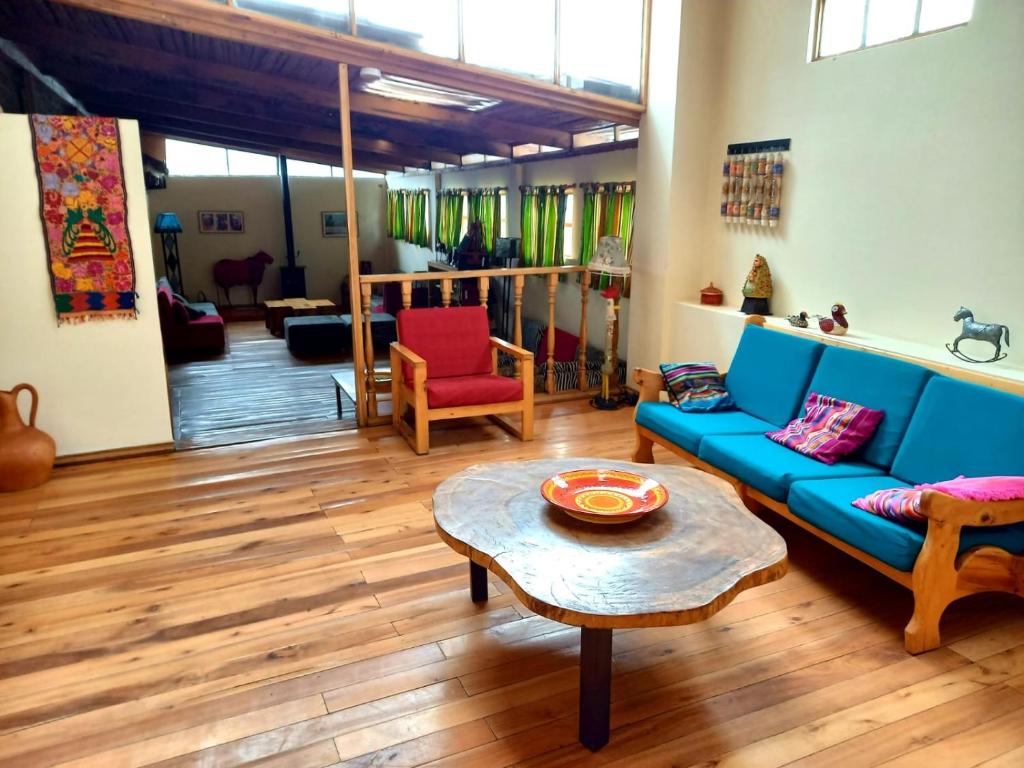 Posezení v ubytování Inti Sisa Art Guesthouse