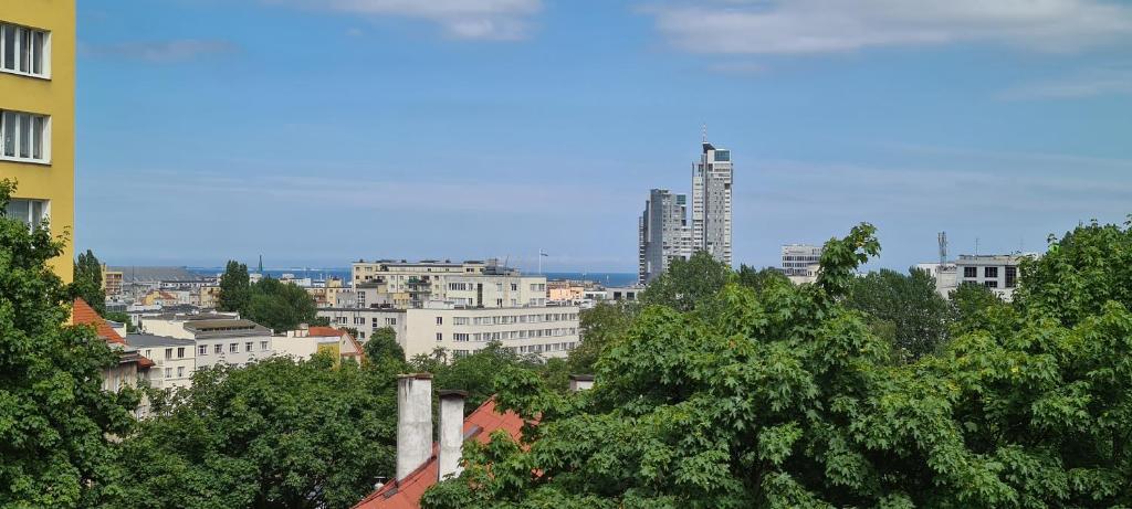 a view of a city with trees and buildings at Apartament Nadmorski Gdynia in Gdynia