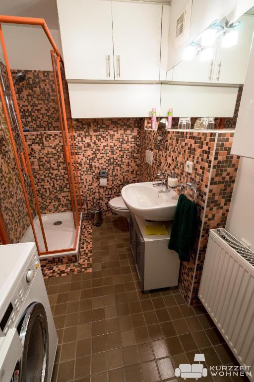 A bathroom at Appartements Steingasse