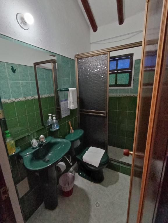 Koupelna v ubytování Aparta Hotel El Refugio de María