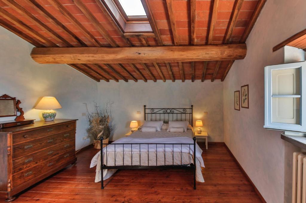Postel nebo postele na pokoji v ubytování Odina Agriturismo