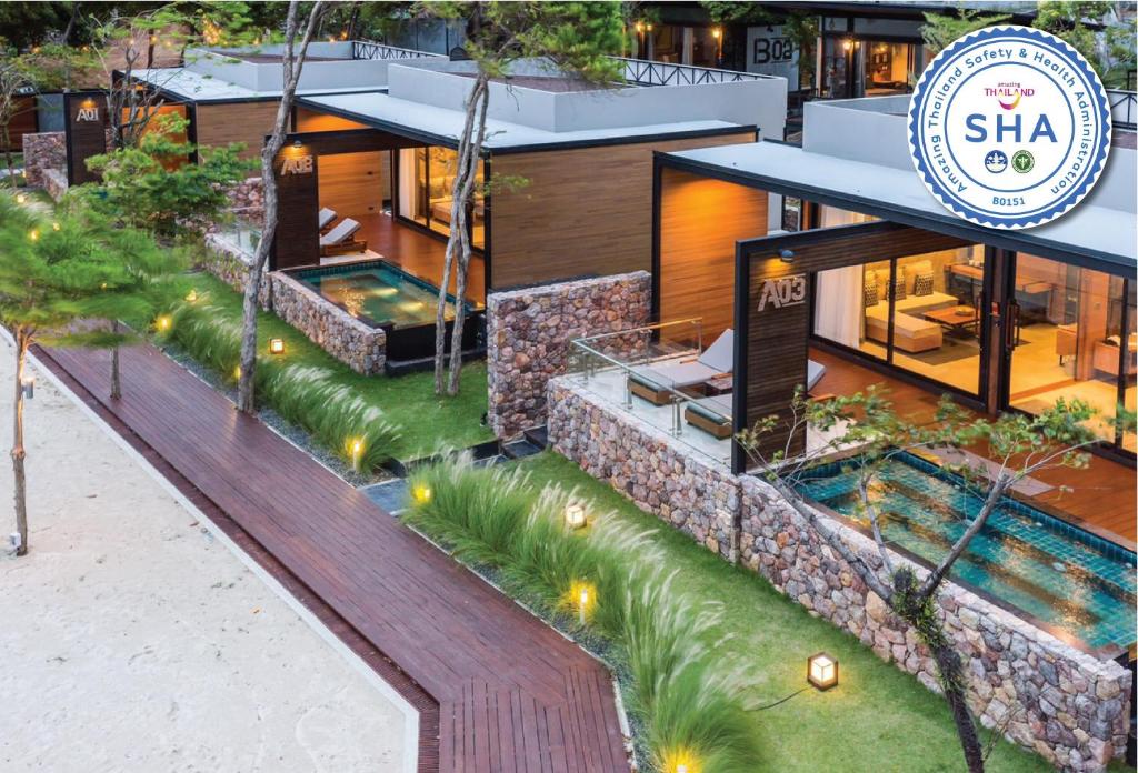 a rendering of a house with a swimming pool at The Cabin Beach Resort in Haad Rin