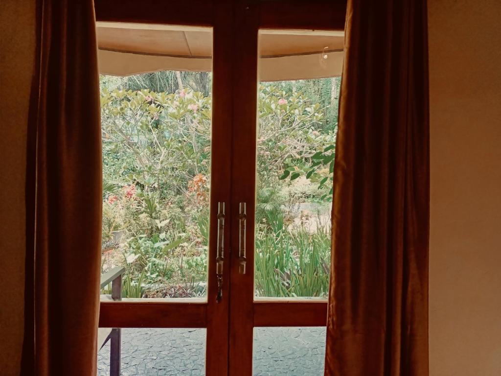 Tangkoko Sanctuary Villa - Villa Mit Gartenansicht