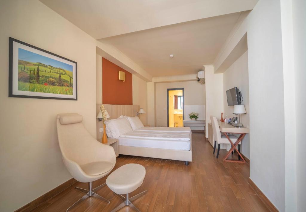 Postel nebo postele na pokoji v ubytování Hotel della Signoria
