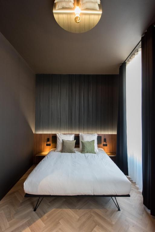 Postel nebo postele na pokoji v ubytování Vinotel X