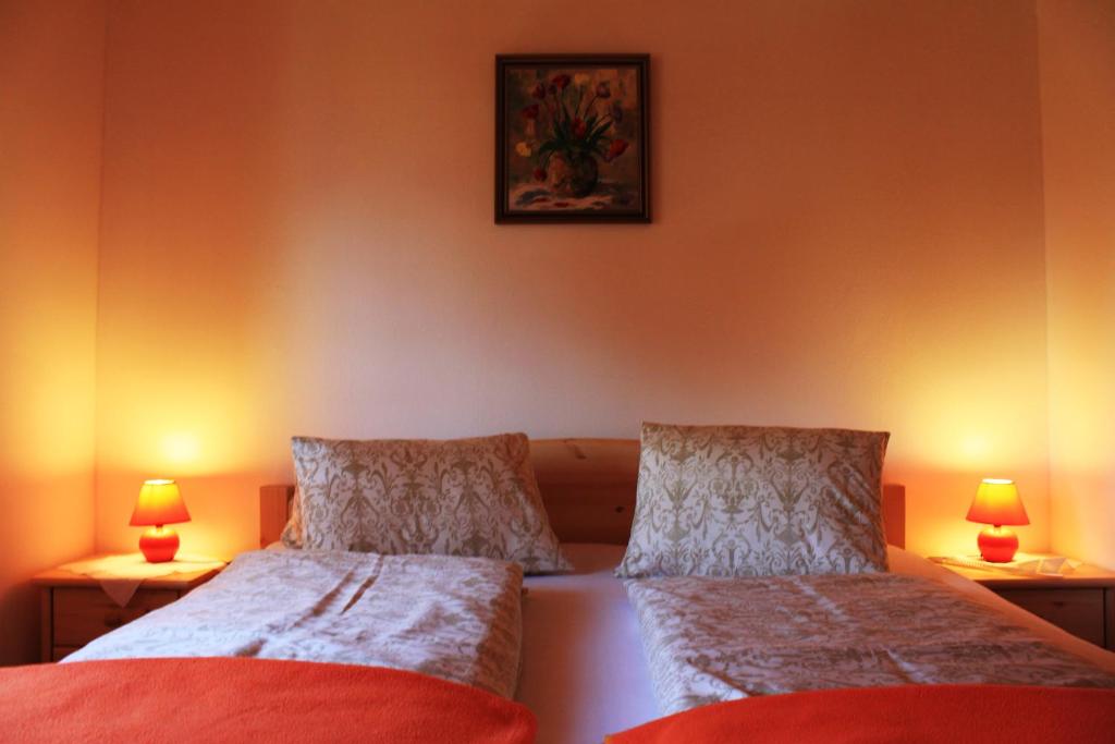 Postel nebo postele na pokoji v ubytování Apartmentshaus Dual -1