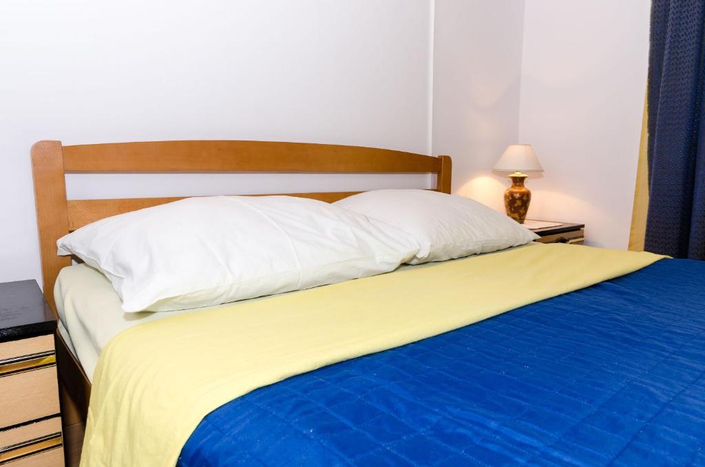 Postel nebo postele na pokoji v ubytování Guest House Dada