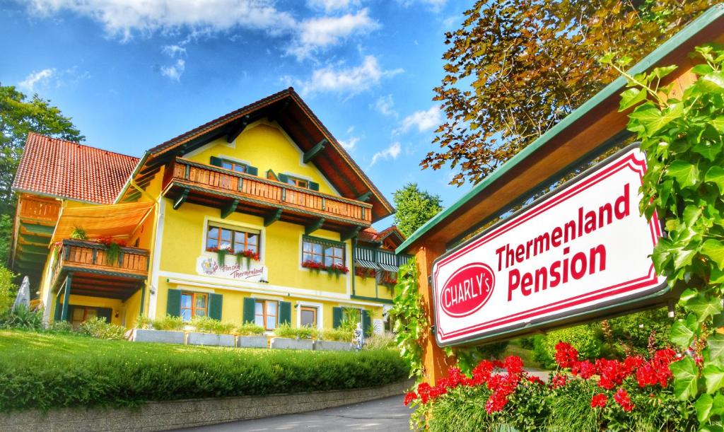 a building with a sign in front of it at Pension Thermenland in Loipersdorf bei Fürstenfeld