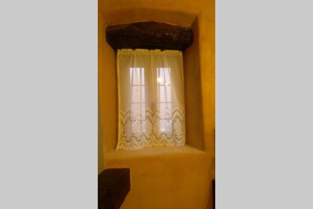 Postel nebo postele na pokoji v ubytování APIGANOS house