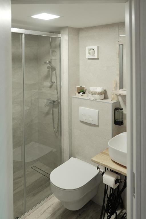 Kúpeľňa v ubytovaní Apartmani Donata