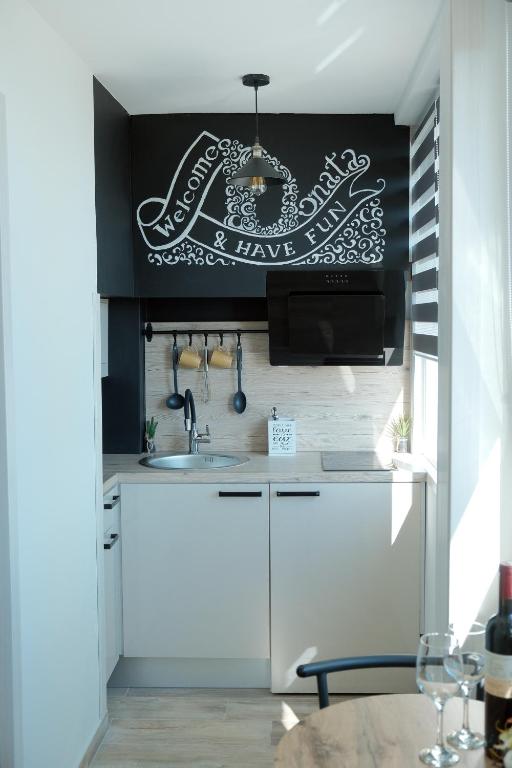 Kuchyňa alebo kuchynka v ubytovaní Apartmani Donata
