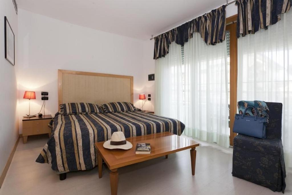 Letto o letti in una camera di Hotel Centrale