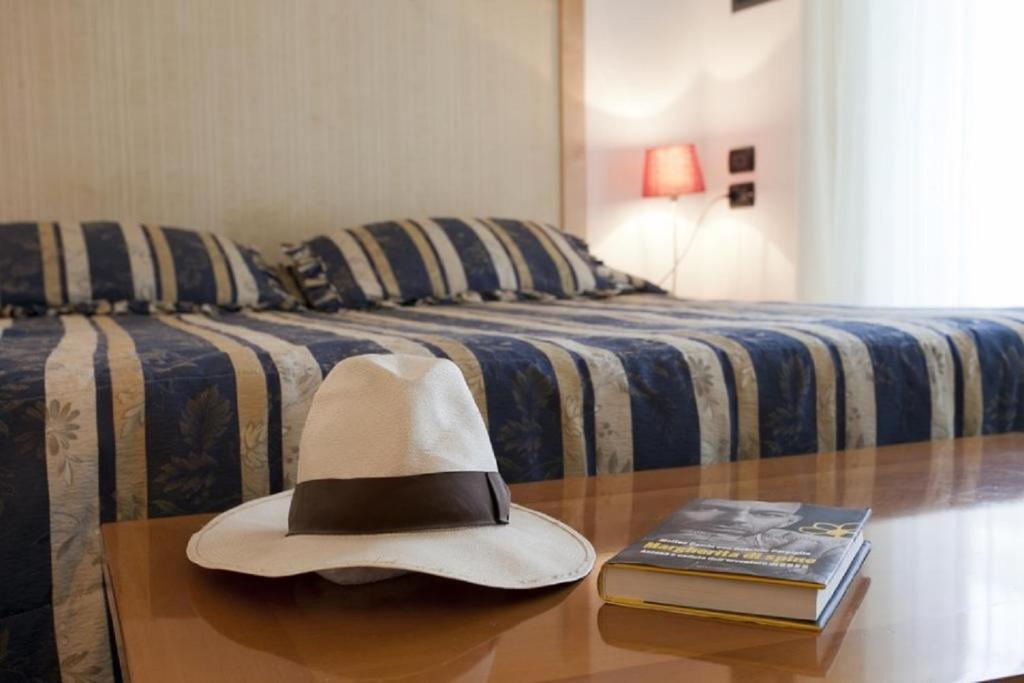 Letto o letti in una camera di Hotel Centrale