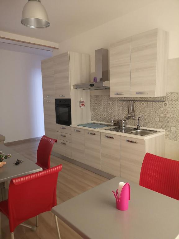 Kuchyň nebo kuchyňský kout v ubytování Muccino B&B