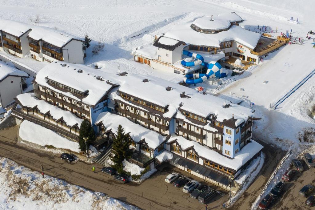an aerial view of a hotel in the snow at Sporting Hotel in Passo del Tonale