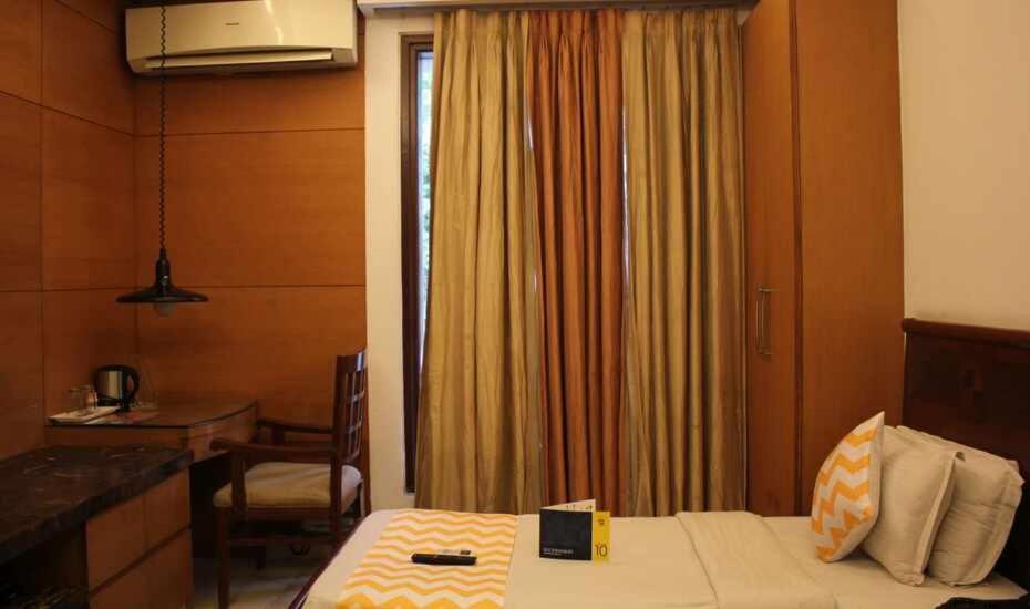 Postel nebo postele na pokoji v ubytování Hotel Good Will Residency - Cyber City Gurgaon