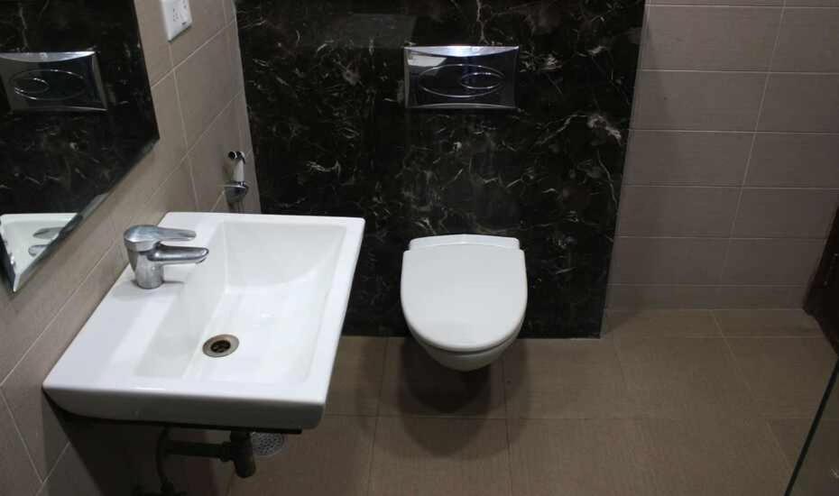 Koupelna v ubytování Hotel Good Will Residency - Cyber City Gurgaon